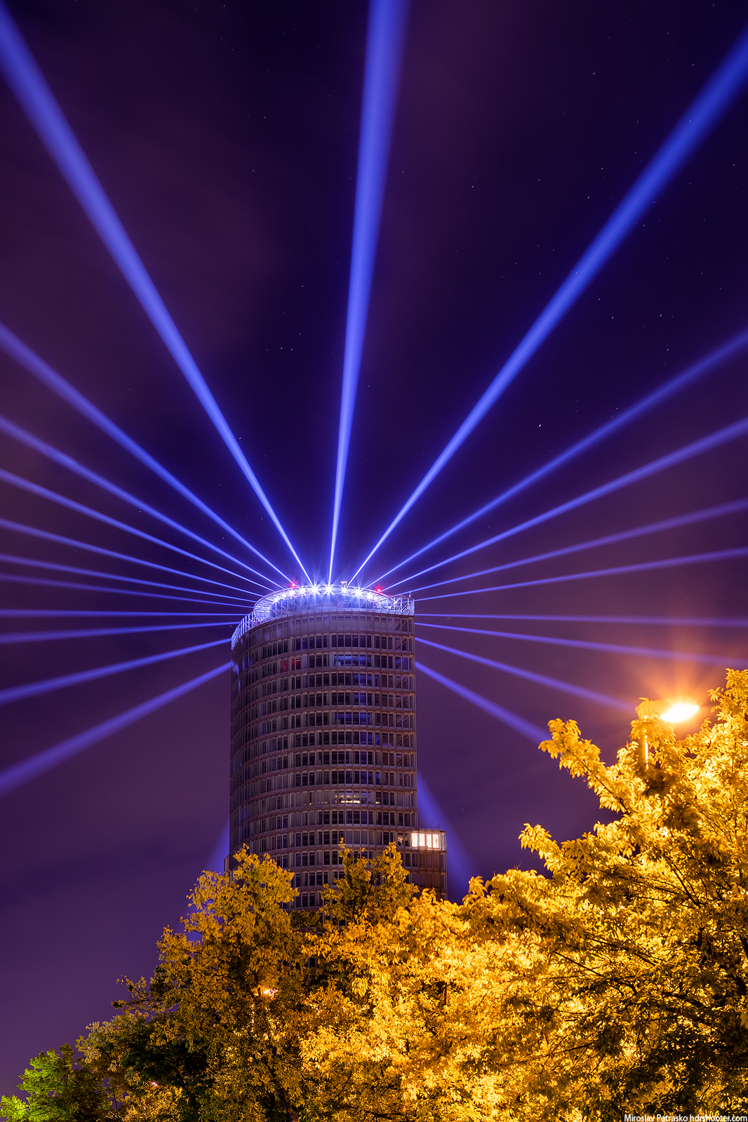 Light beams in the night sky, Bratislava, Slovakia - HDRshooter